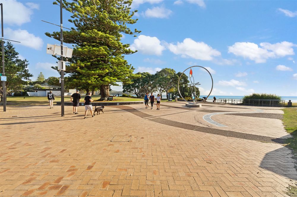 The beachfront reserve and walkway at the main entrance to Orewa Beach, Auckland